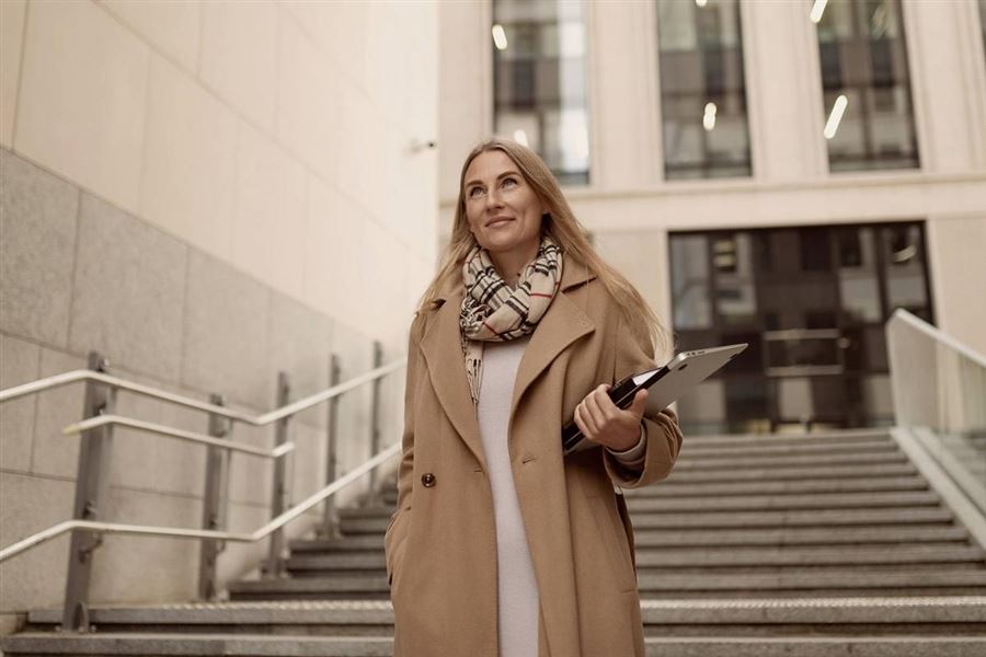Woman walking down stairs