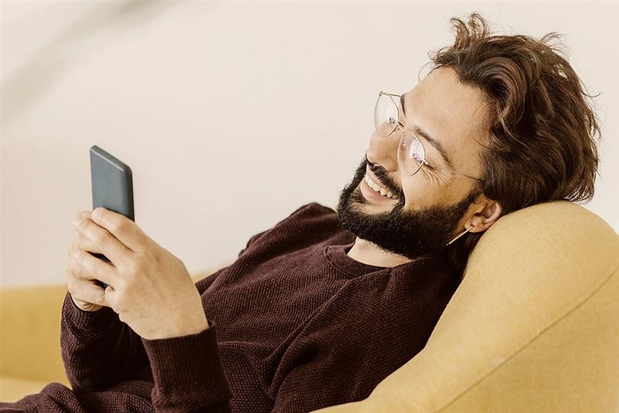 Smiling man with phone