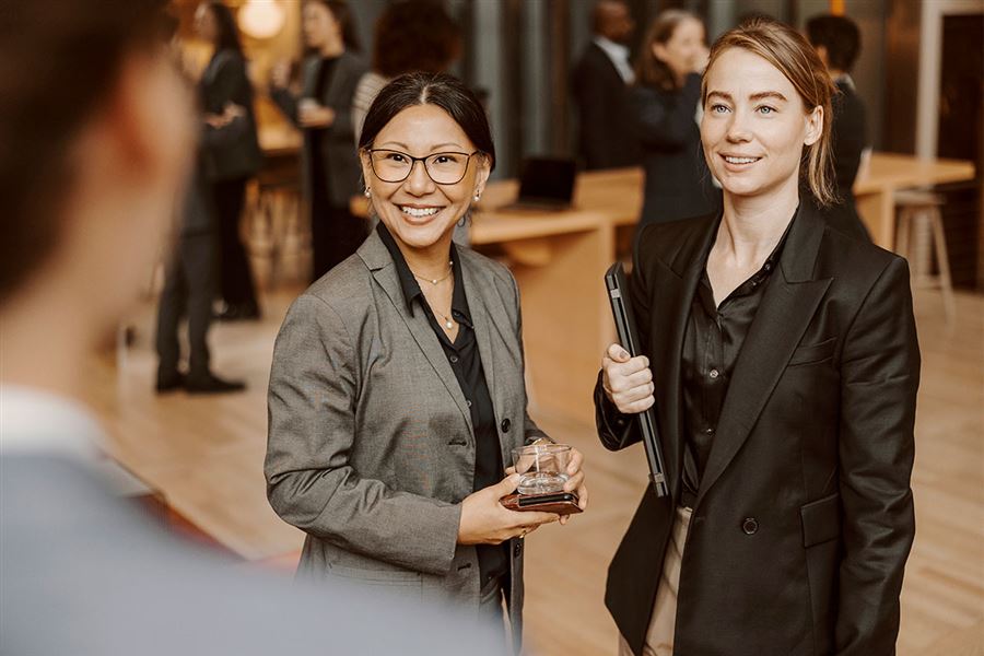 Two smiling colleagues