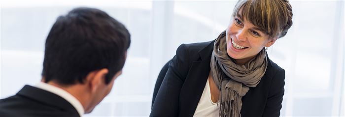 Business woman and man in meeting